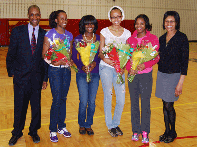 Coach McKenzie, Dicoda Waugh, Demia Franklin, Saleena Green, Erica Nixon  and A.D. Patricia Thomas following the Women's Track & Field Senior Night ceremony
